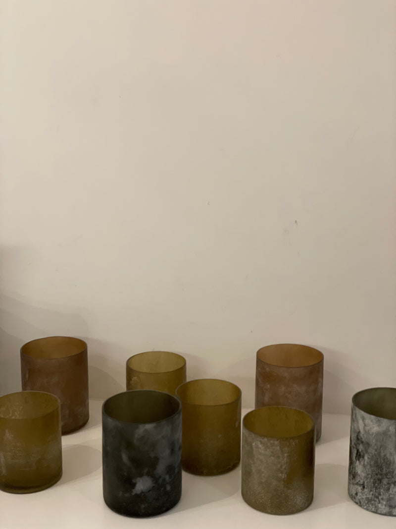 Candle holder in green glass